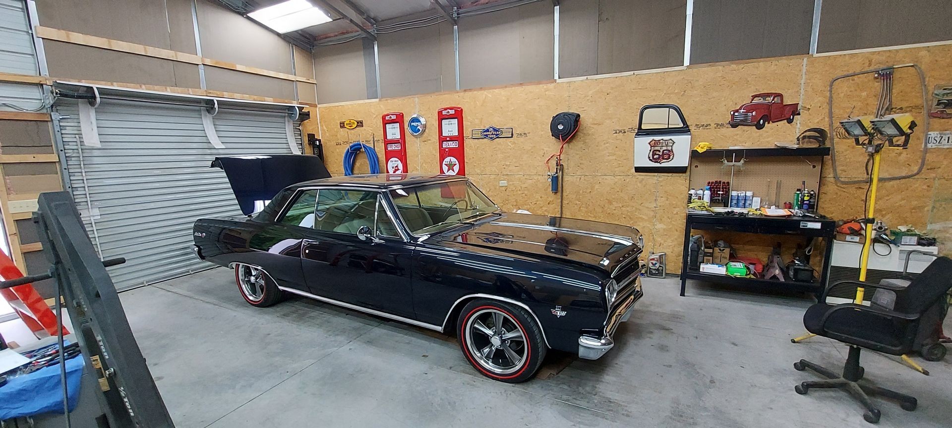 1965 Chevelle in a garage.